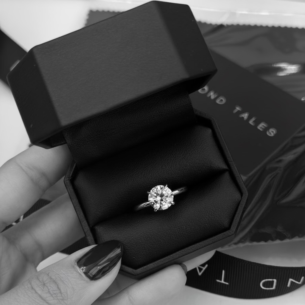engagement ring by diamond tales