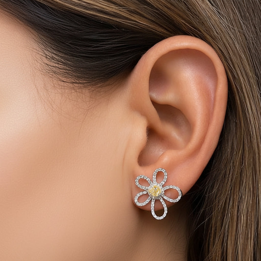 18k gold fancy yellow and round diamond flower earrings by Diamond Tales