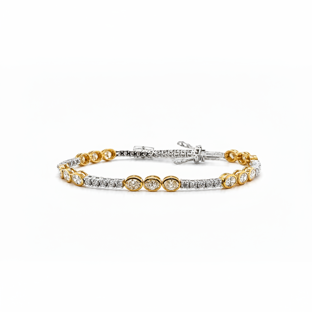 18k two-tone tennis bracelet with oval Fancy Yellow and round white diamonds