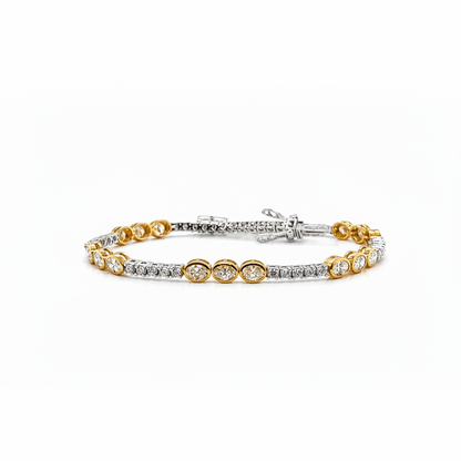 18k two-tone tennis bracelet with oval Fancy Yellow and round white diamonds