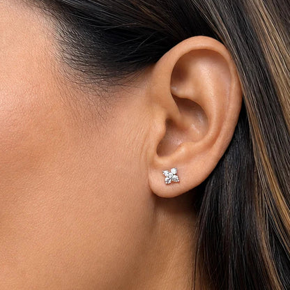 18k gold flower-cluster stud earrings with diamonds totaling 0.47 carats