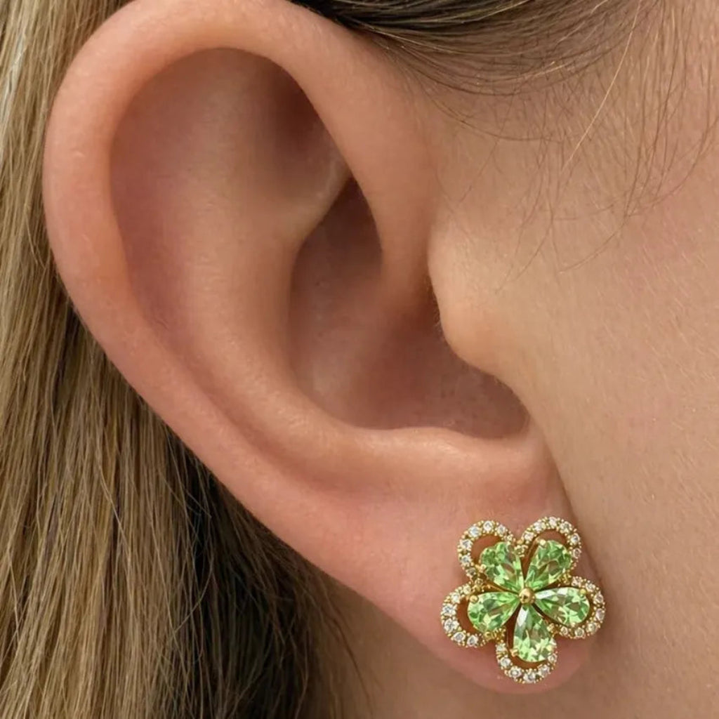18k gold floral stud earrings with green garnet petals and detachable diamond jacket