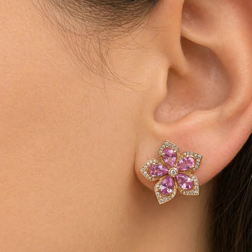 14k rose gold flower stud earrings with pink sapphire petals and diamond centers