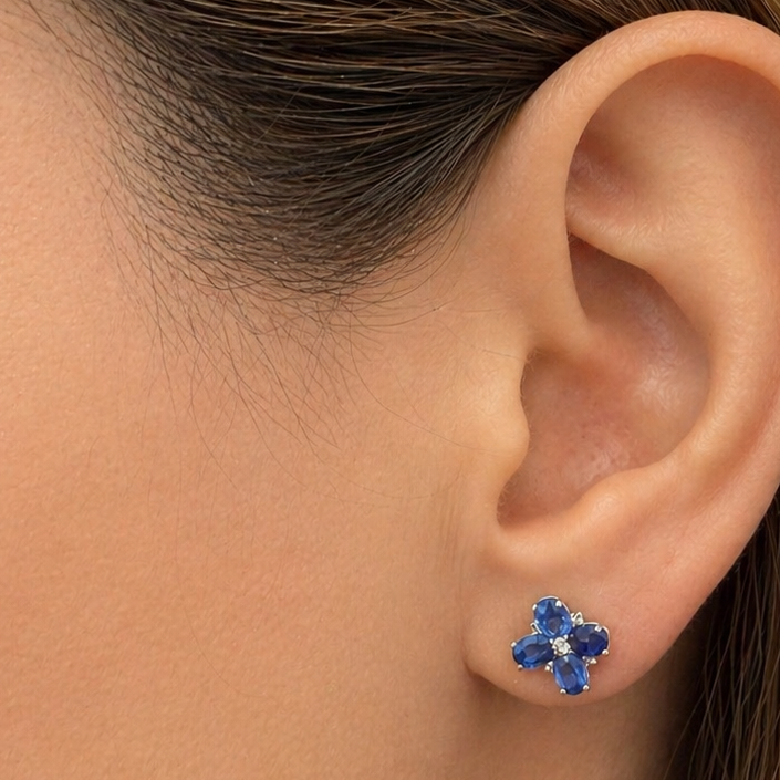 18k gold flower kyanite and diamond stud earrings by Diamond Tales