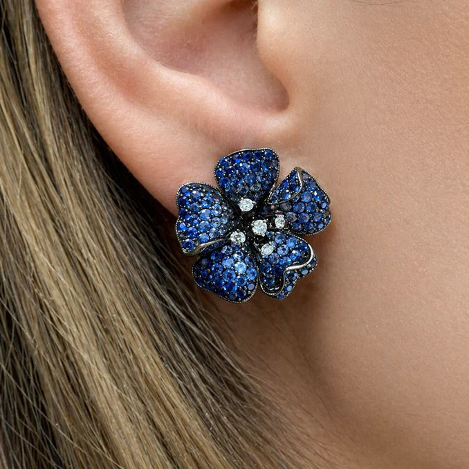 18k white gold flower earrings with gradient blue sapphires and diamond accents