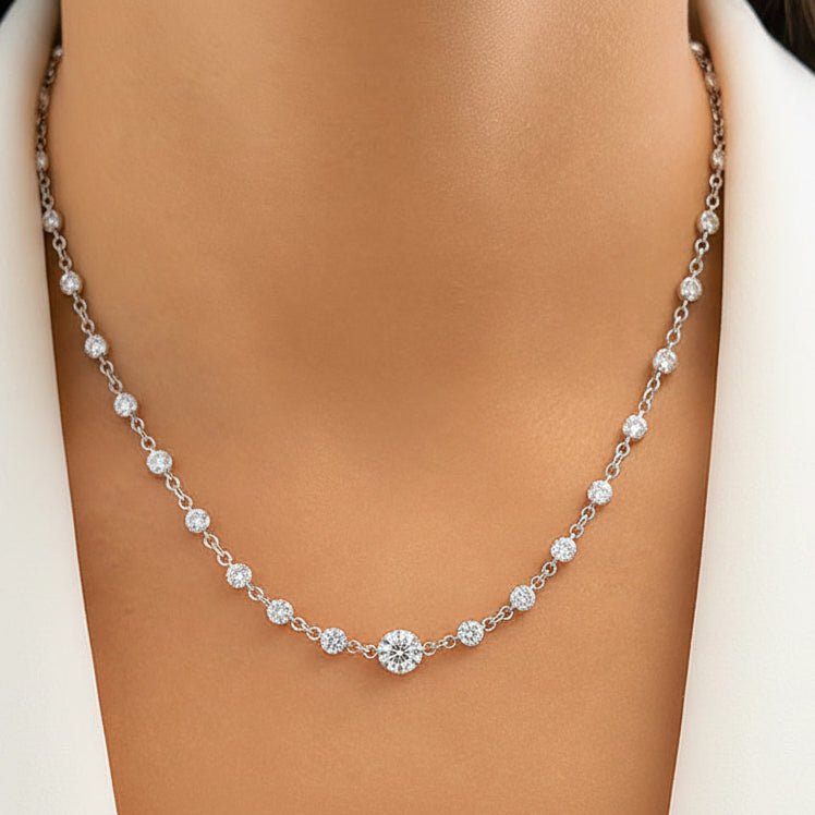 18k white gold chain link necklace with graduated round diamonds set in each link