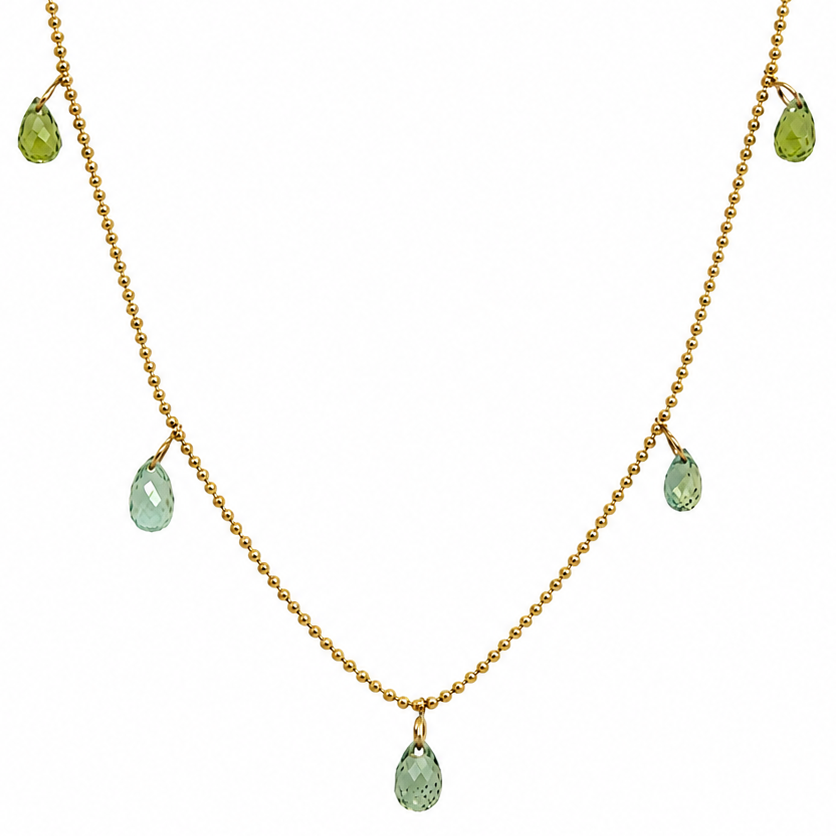 14k gold shaker necklace with five green sapphires