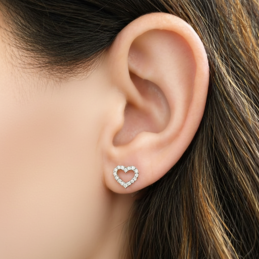 18k white gold heart diamond stud earrings by Diamond Tales