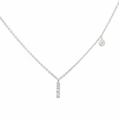14k white gold pendant necklace featuring the letter “I” accented with diamonds