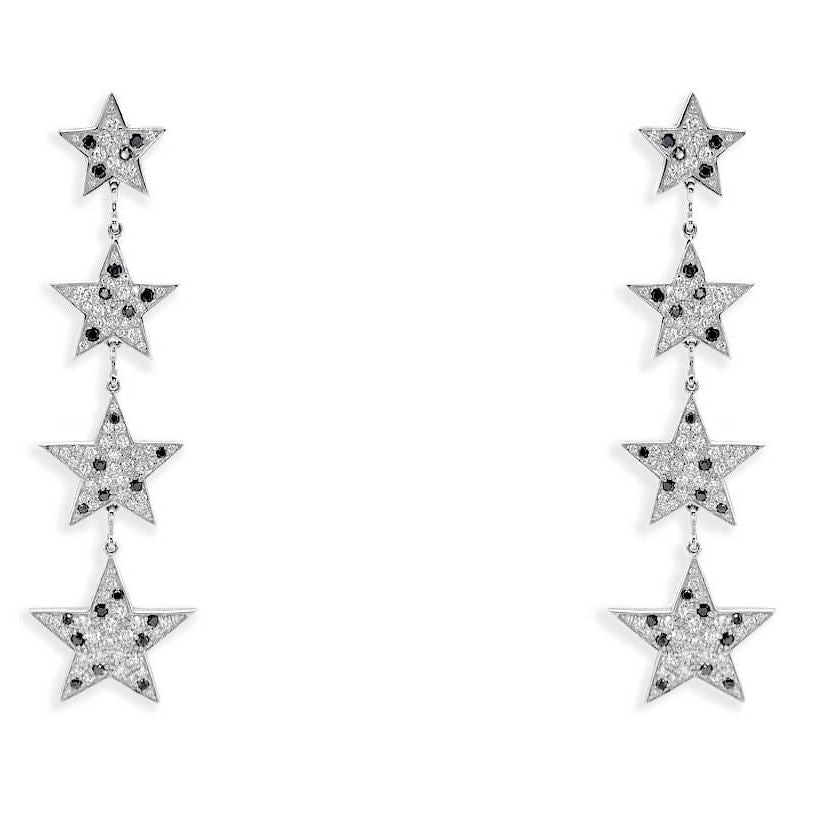 18k gold inline star diamond drop earrings by Diamond Tales