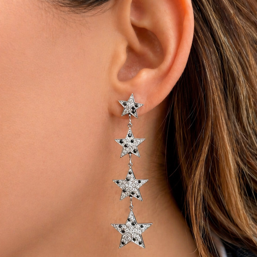 18k gold inline star diamond drop earrings by Diamond Tales