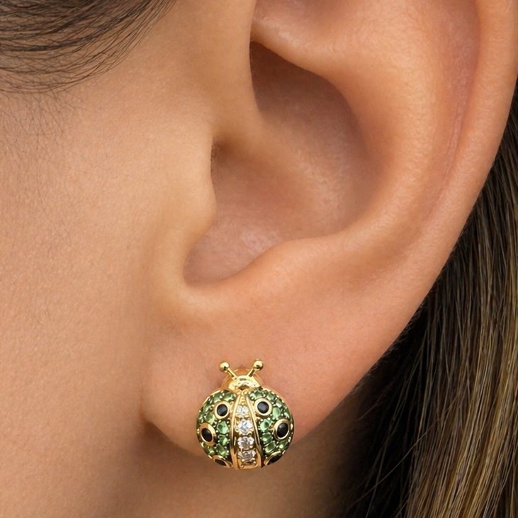 18k gold ladybug earrings with rubies and round brilliant diamonds by Diamond Tales