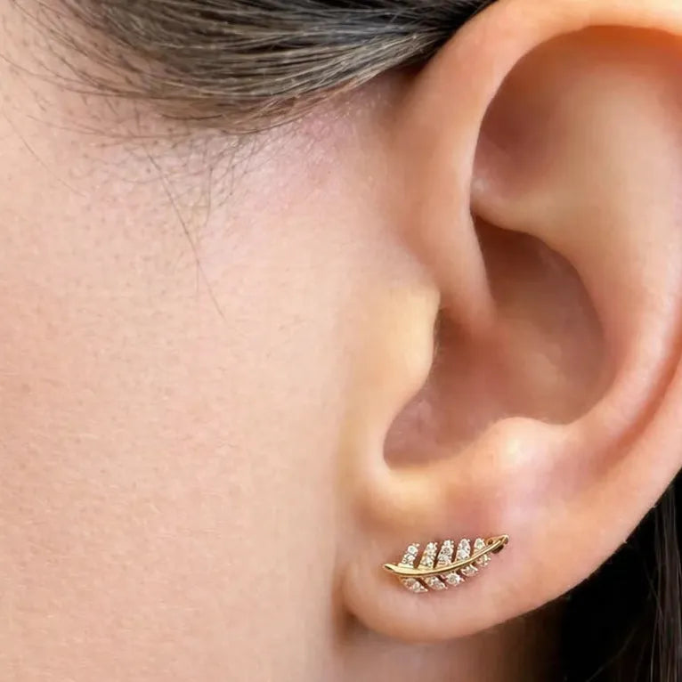 14k yellow gold leaf stud earrings with pavé diamond detailing