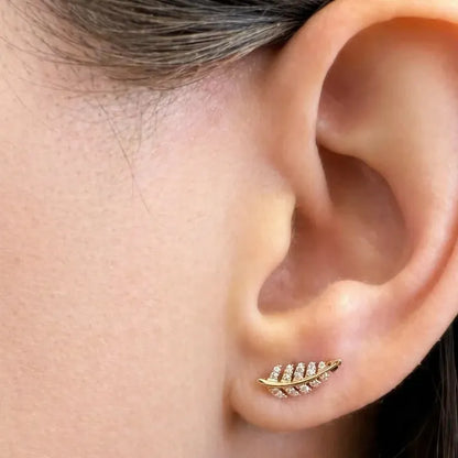 14k yellow gold leaf stud earrings with pavé diamond detailing