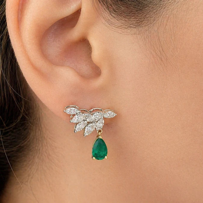 18k white gold drop earrings with pear emeralds and round diamond accents