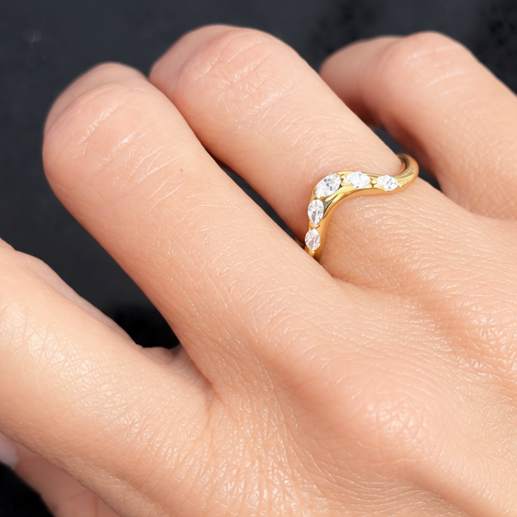 14k yellow gold ring with marquise-cut diamond by Diamond Tales