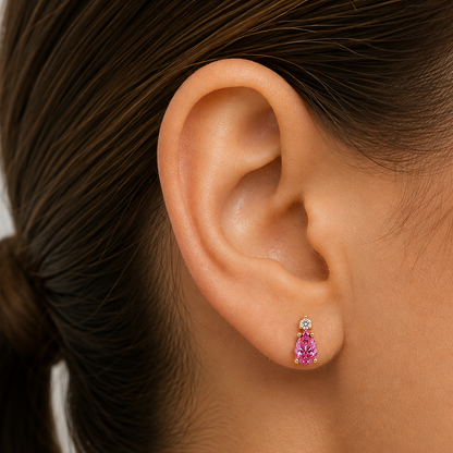 Macro detail of the pear-shape pink sapphire and round diamond setting