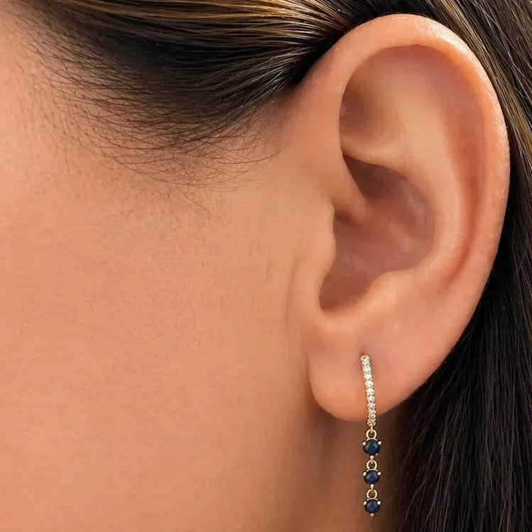 mini sapphire and diamond hoop earrings in 14k gold with blue sapphires and diamond accents