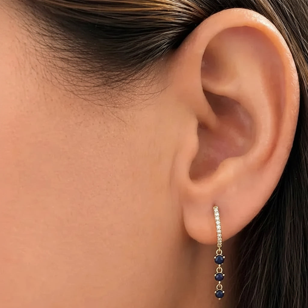 mini sapphire and diamond hoop earrings in 14k gold with blue sapphires and diamond accents