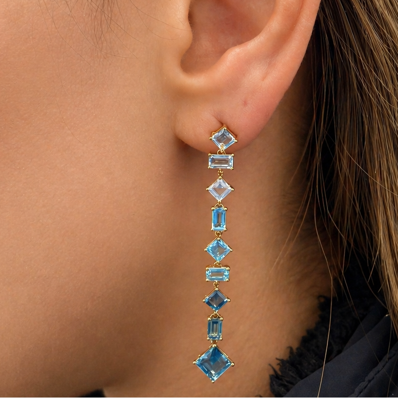 18k gold mixed cut blue topaz inline earrings by Diamond Tales