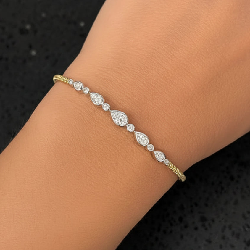 mixed gold diamond bangle bracelet in 14k gold with diamond accents