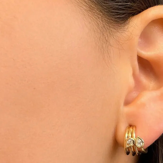 Modern design diamond earrings in 14k yellow gold