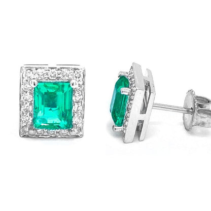 18k white gold stud earrings featuring natural Colombian emeralds and diamond accents