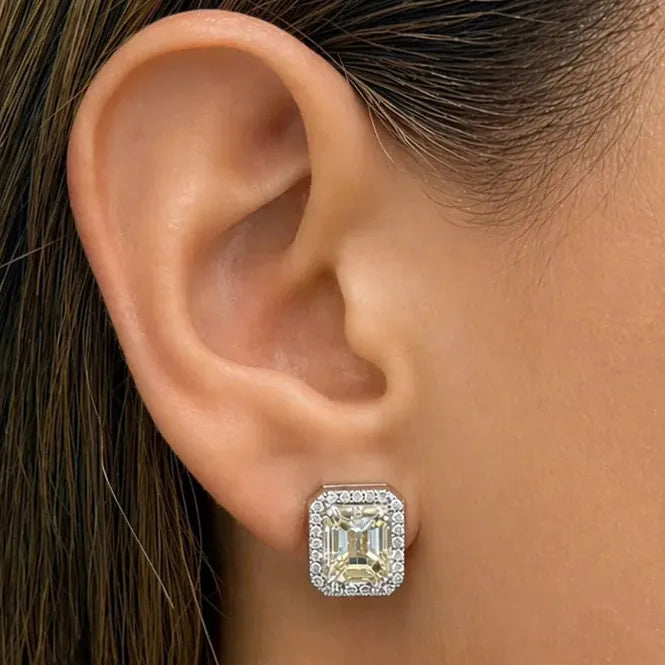 18k white gold earrings with GIA-certified emerald-cut diamonds and pavé-set round diamonds