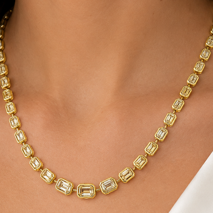 Detail of the graduated emerald-cut Fancy Yellow diamonds