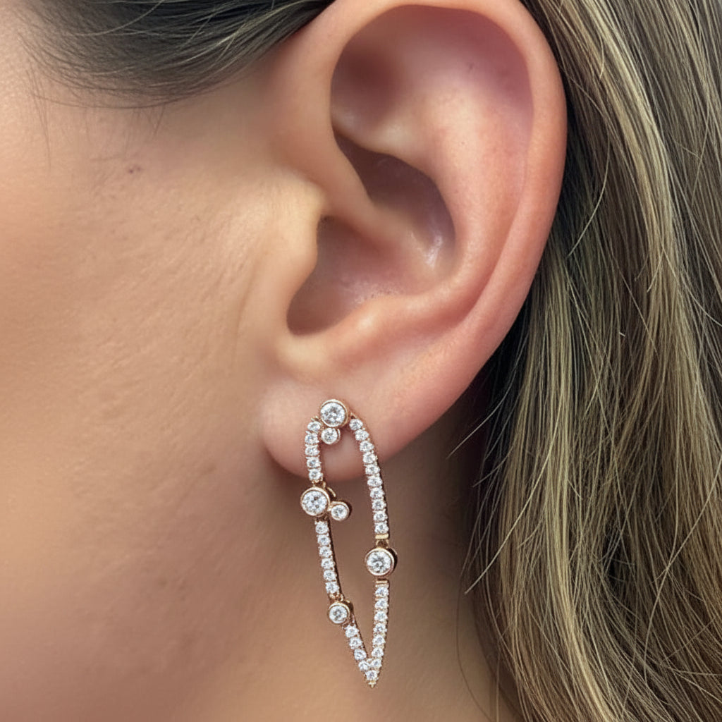 18k rose gold open elongated silhouette earrings with 78 round brilliant-cut diamonds totaling 1.11 carats