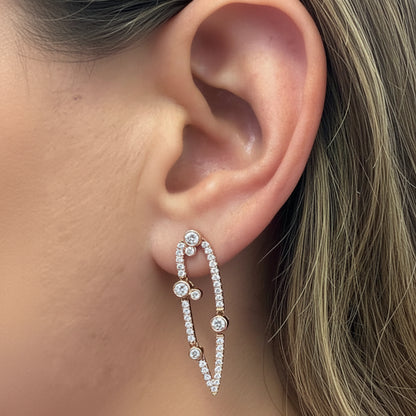 18k rose gold open elongated silhouette earrings with 78 round brilliant-cut diamonds totaling 1.11 carats
