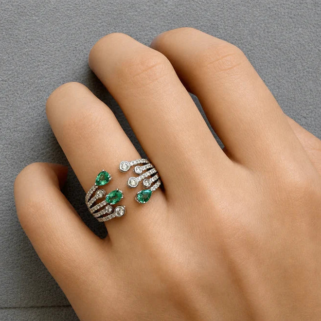 Open ring with pear emeralds and diamonds in 18k gold – Diamond Tales