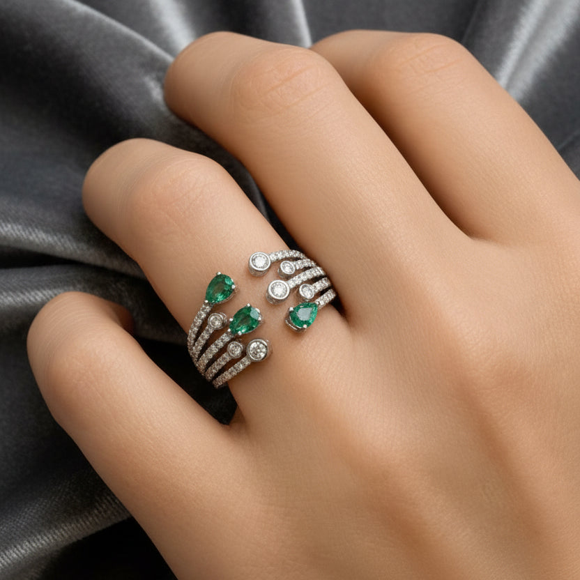Open ring with pear emeralds and diamonds in 18k gold – Diamond Tales