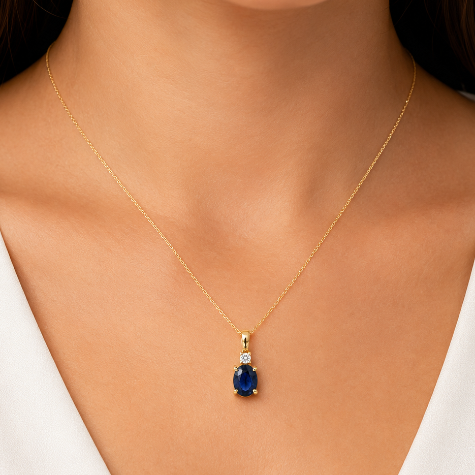 oval blue sapphire and diamond pendant necklace in 14k gold, detail view