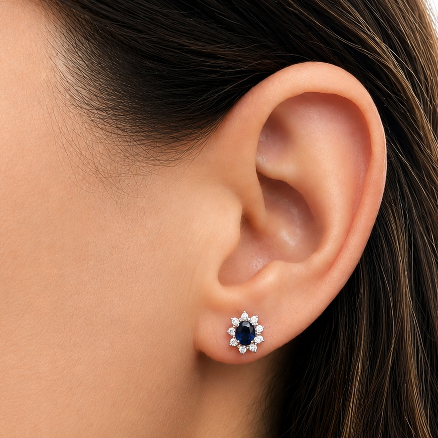 18k gold oval emerald and diamond stud earrings
