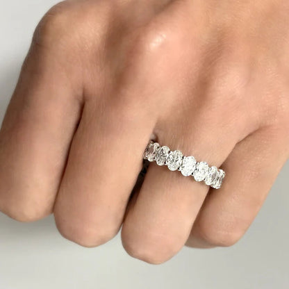 platinum eternity band with oval-cut diamonds totaling 4.54 cts