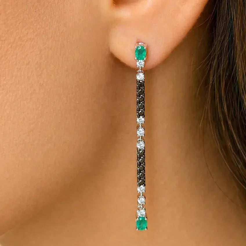 18k gold drop earrings with oval emeralds and diamond accents