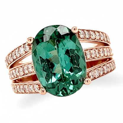 14k rose gold ring with oval green tourmaline center and diamond split-shank