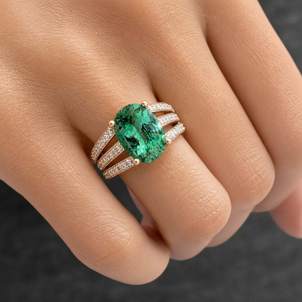 14k rose gold ring with oval green tourmaline center and diamond split-shank