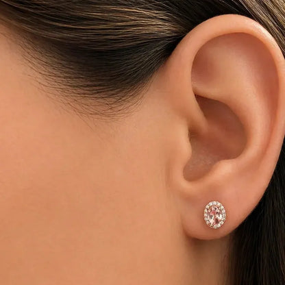 oval morganite and diamond halo stud earrings in 14k gold