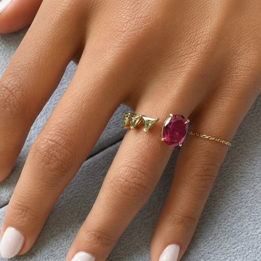 18k yellow gold ring with oval rubellite and green sapphire accents