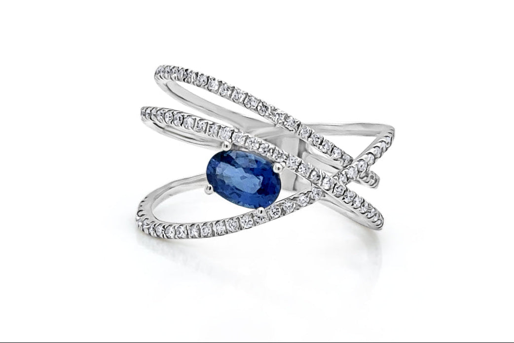 oval sapphire and diamond criss cross ring in 14k gold