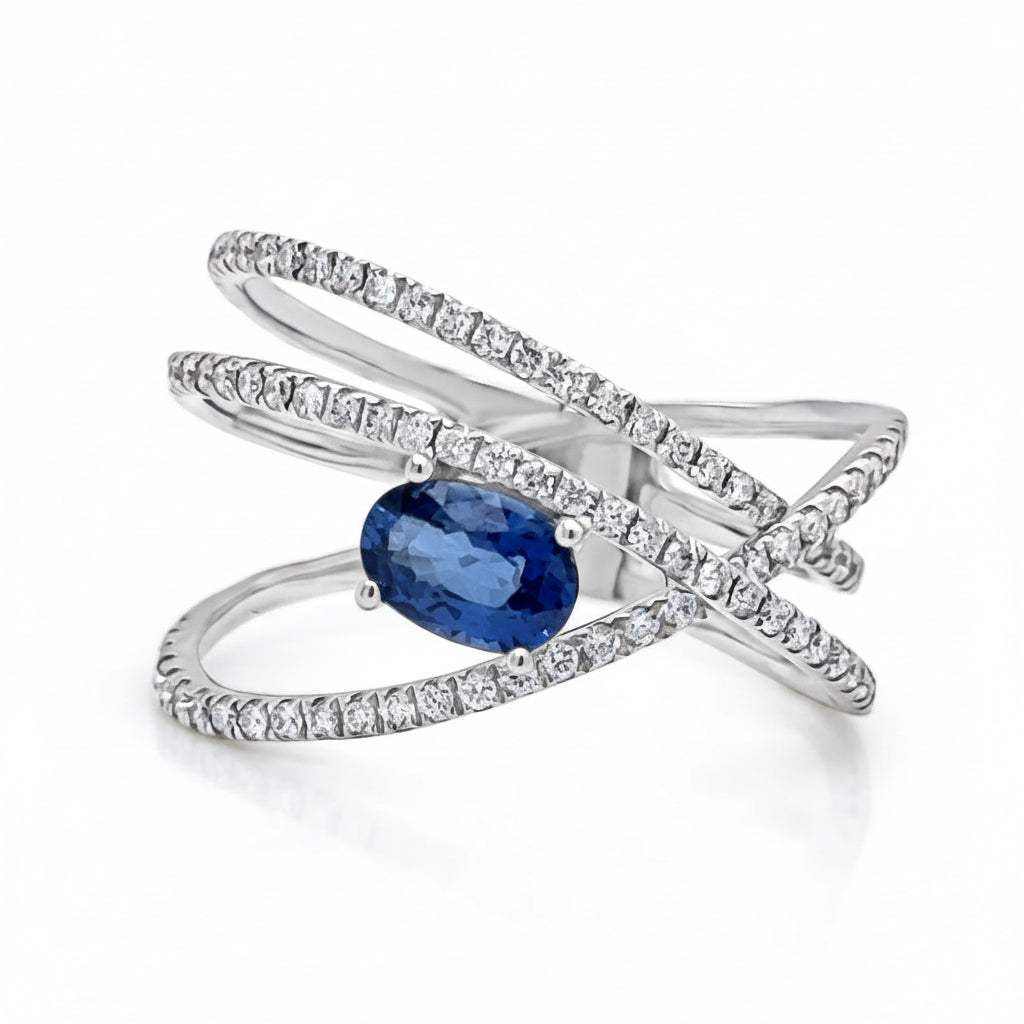 oval sapphire and diamond criss cross ring in 14k gold