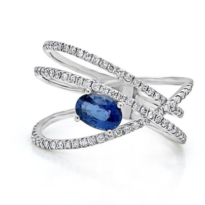 oval sapphire and diamond criss cross ring in 14k gold