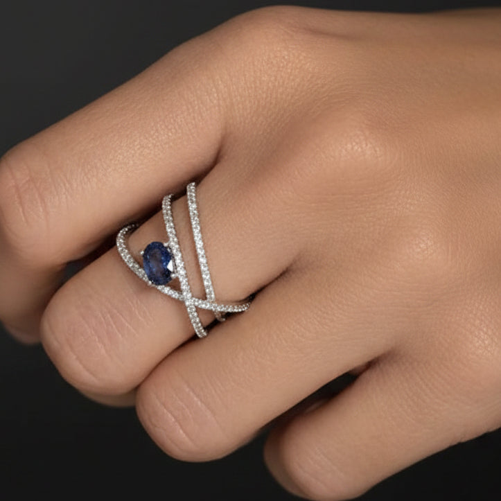 oval sapphire and diamond criss cross ring in 14k gold