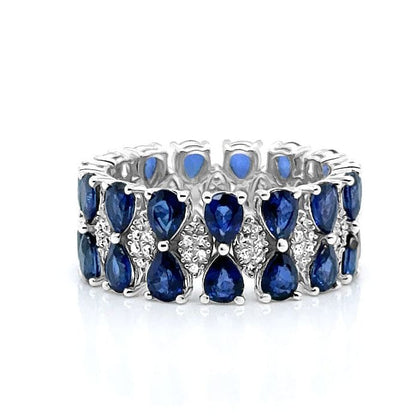 pear blue sapphire and diamond ring in 14k gold