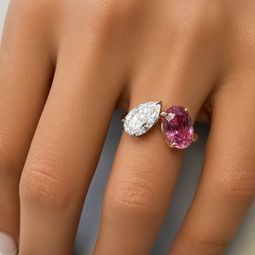 Pear diamond and oval pink sapphire ring in 18k gold