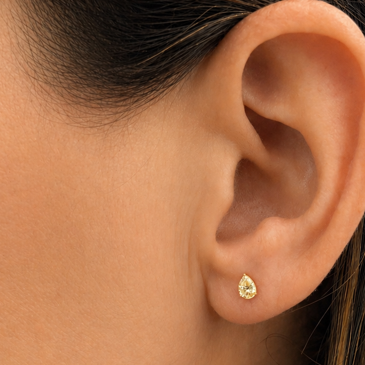 18k gold pear-shaped diamond stud earrings by Diamond Tales