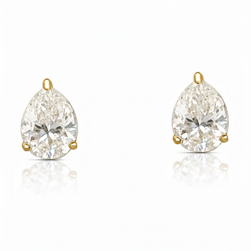 18k gold pear-shaped diamond stud earrings by Diamond Tales