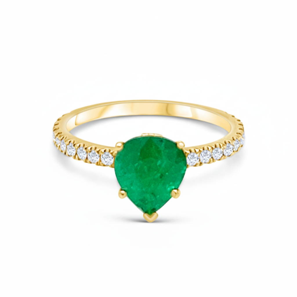 18k yellow gold pear emerald ring with round brilliant diamonds by Diamond Tales